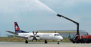 Als die Geschäfte noch gut liefen: ein Flugzeug der Tessiner Fluggesellschaft Darwin auf dem Flughafen Leipzig/Halle. (Bild: Peter Endig/Keystone (2. September 2013))