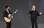 Bono: «Während andere Mauern bauen, öffnet ihr Türen.» (Bild: Justin Tang/AP)