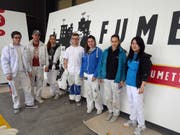 Sie sorgen für die richtige Kulisse am Infopoint (vlnr): Kevin Birrer, Kilian Wigger, Paola Ricci, Jonas Bettin, Selina Carraco Da Silva, Frieda Gysin und Rosmarie Do. (Bild: PD/Luzernermaler)