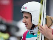 Nicht zufrieden: Simon Ammann liegt nach dem ersten Sprung nur auf dem 18. Platz (Bild: KEYSTONE/URS FLUEELER)