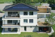 Doppeleinfamilienhaus in Uffikon nach der Sanierung (Bild: PD / Solarpreis 2015)