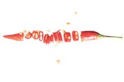Scharfmacher Chilischote. mit einem scharfen Messer zerlegt. (Bild: Getty)