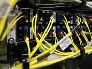 Die Schweiz belegt beim Breitbandausbau im europäischen Vergleich einen Spitzenplatz. Das ist das Ergebnis einer Studie. (Symbolbild) (Bild: Daniel Roland/Keystone)