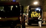 Der Mannschaftsbus von Borussia Dortmund nach dem Bombenanschlag. (Bild: Friedemann Vogel/EPA (Dortmund, 11. April 2017))