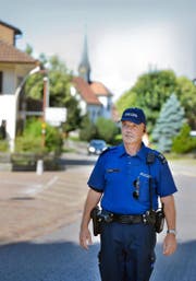 Viktor Tschopp (54), Polizist am Posten Pfaffnau, ist auch für die Sicherheit des Nachbardorfes Roggliswil (Bild) besorgt. (Bild Nadia Schärli)