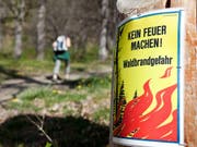 Der Kanton Luzern warnt vor Waldbrandgefahr (Archiv). (Bild: KEYSTONE/ARNO BALZARINI)