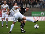 Unentschieden im Tessin: Luganos Mattia Bottani (rechts) gegen Luzern Jerome Thiesson (Bild: KEYSTONE/TI-PRESS/GABRIELE PUTZU)