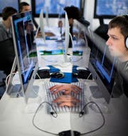 Gymnasiasten sollen nicht nur über Textverarbeitungsprogramme Bescheid wissen, sondern ein Grundverständnis über Informatik haben. (Bild: AFP/Martin Bureau)