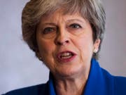 Die britische Premierministerin Theresa May kritisiert das pauschale Verbot des Fahrdienstleisters Uber in London als unverhältnismässig. (Bild: KEYSTONE/EPA/WILL OLIVER)