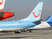Ein Maschine der TUI auf dem Flughafen in München (Archiv) (Bild: Keystone)