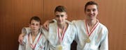 Erfolgreich: die Baarer Magomed Batsiev, Adam Batsiev und Fabio Rogenmoser (von links). (Bild: PD)