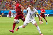 Bestritt 22 Partien für Portugals Nationalteam: Ricardo Costa (links) bei der WM 2014 in Brasilien gegen Clint Dempsey (USA). (Bild: Getty/Adam Pretty)