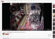 Das Gesicht des Täters (rot eingekreist) ist im Youtube-Video nur vage zu erkennen. (Bild: Screenshot Youtube/Bearbeitung OZ)