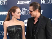 Das Paar Jolie-Pitt an einer Premierenfeier im Jahr 2014 (Bild: KEYSTONE/AP Invision/MATT SAYLES)