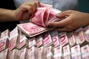 Die Behörden haben die illegalen Machenschaften der bisher grösste Untergrundbank Chinas aufgedeckt. (Bild: Chinatopix via AP)