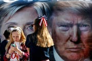Laut einer Umfrage für die «Washington Post» und ABC News lagen beide Kandidaten in der Gunst der registrierten Wähler bei jeweils 41 Prozent. (Bild: AP Photo / Mary Altaffer)