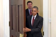 Präsident Barack Obama, gefolgt von FBI Direktor James Comey. (Bild: AP Photo/Susan Walsh, File)