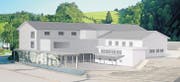 Die Ansicht von Brunnadern her (ohne Feuerwehrhaus): Der auf Stützen gestellte Vorbau markiert klar den Eingangsbereich zur Schulanlage.