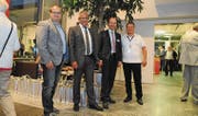 Zwei Hauseigentümervereine spannen zusammen: Noldi Bauman, HEV Flawil, Werner Britt, HEV Degersheim, Urs Fässler, CEO Krüger & Co. AG, und Richard Baumann, Zurich-Generalagentur (v. l.). (Bild: Michael Hug)
