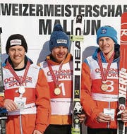 Das Siegerfoto der Schweizer Meisterschaften Riesenslalom in Malbun: Marco Giger (2.), Rémi Cuche (1.) und Nick Spörri (3.). (Bild: pd)
