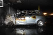 Beim Brand in der Tiefgarage entstand hoher Sachschaden. (Bild: Kapo SG)