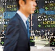Der Kurseinbruch an der Wall Street hat gestern auch an asiatischen Börsen für gewaltige Verluste gesorgt. (Bild: Noriko Hayashi/Bloomberg (Tokio, 6. Februar 2018))