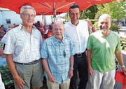 Fotokünstler und Vernissageredner vereint (von links): Röbi Kuster, Hans Spirig, Gemeinderat Patrick Spirig und Fredi Durot. (Bild: Ulrike Huber)