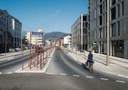 Oben: Das neue Rathaus (rechts) schafft einen öffentlichen Platz vor der Kirche. Unten: Die umgestaltete Bahnhofstrasse in Widnau. (Bilder: Michel Canonica)