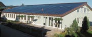 Das erste Projekt der Solargenossenschaft: die Photovoltaik-Anlage auf dem Sonnenrainschulhaus. (Bild: PD)
