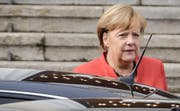 Unter Druck: Angela Merkel. (Bild: MICHAEL KAPPELER (DPA dpa))