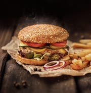 Der Hamburger macht sich auch in vornehmer Umgebung gut. (Bild: Getty)