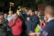 Venezuelas Präsident Nicolás Maduro bei einer Rede nach dem Sieg seiner Partei am Sonntag. (Bild: EPA (Caracas))