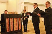 Die vier Musiker: David Lang, Chasper-Curò Mani, Raphaël Favre und Paul Erkamp in der katholischen Kirche St. Jakobus. (Bild: Judith Meyer)