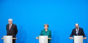 Haben sich auf einen neuen Koalitionsvertrag geeinigt: Horst Seehofer (links), Angela Merkel und Martin Schulz. (Bild: Keystone)