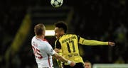 Dortmunds Pierre-Emerick Aubameyang (rechts) gegen Monacos Kamil Glik. (Bild: Jan Hübner/imago)