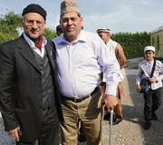 Referent Yahya Hassan Bajwa mit Besucher Mohammed Ayyub. (Bild: Nana do Carmo)