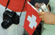 Herr und Frau Schweizer finden ihre Fotosujets in den Ferien gerne in der Destination Toggenburg. (Bild: Martial Trezzini/Keystone)