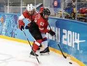 Da war die Welt noch in Ordnung: Anja Stiefel an den Olympischen Spielen in Sotschi im Spiel gegen Russland. (Bild: Martin Rose/Getty)