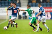 St.Galler und Luzerner werden sich nichts schenken: St.Gallens Marco Aratore (Mitte) gegen Hekuran Kryeziu vom FC Luzern. (Bild: URS FLUEELER (KEYSTONE))