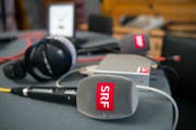 Die SRG hat sich selber zur nationalen Institution erklärt. Slogans wie «Idée suisse», «Schweiz im Herzen» und der schweiztümelnde Auftritt der nationalen TV- und Radiosender wirken nach. (Bild: PETER SCHNEIDER (KEYSTONE))
