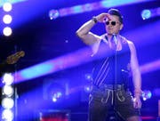 Andreas Gabalier in Aktion. (Bild: OLIVER BERG (EPA))