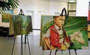 Brauchtum und Berge bezaubern Bankbesucher (Bild: Jolanda Riedener)