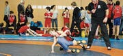 Alessandro Fässler (in Rot) vom RC Oberriet-Grabs gibt an der Ostschweizer Jugendmannschaftsmeisterschaft alles. (Bild: PD)