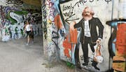 Marx lebt – nicht nur in etwas schummrigen Unterführungen wie hier in Berlin.