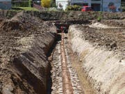 In Münchwilen AG wurde ein Teil einer römischen Wasserleitung freigelegt. Sie versorgte eine frühzeitliche Raststätte mit dem kostbaren Nass. (Bild: Handout Kantonsarchäologie AG)