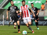 Jonas Hector (rechts) bleibt Köln treu, Abstieg hin oder her (Bild: KEYSTONE/EPA/SASCHA STEINBACH)