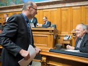 Bauernverbands-Präsident Markus Ritter (CVP/SG) und Landwirtschaftsminister Johann Schneider-Ammann sprechen jetzt auch ausserhalb des Ratssaals wieder zusammen. (Bild: KEYSTONE/ANTHONY ANEX)