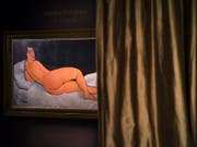 Diese nackte Schönheit ist Millionen Wert: "Nu couché (sur le côté gauche)" von Amedeo Modigliani wird versteigert. (Bild: KEYSTONE/AP/VINCENT YU)