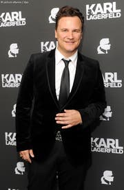 Designer Guido Maria Kretschmer kommt am 04.09.2013 in München (Bayern) zur Eröffnung eines Karl Lagerfeld Stores. Foto: Tobias Hase/dpa (Bild: Tobias Hase (dpa))