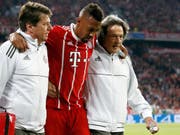 Jérôme Boateng muss gegen Real Madrid vom Feld geführt werden (Bild: KEYSTONE/EPA/RONALD WITTEK)